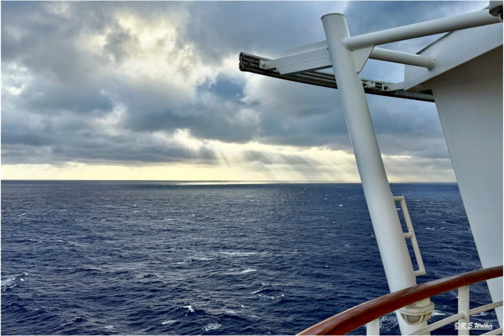 Main image Sunlight coming through Clouds